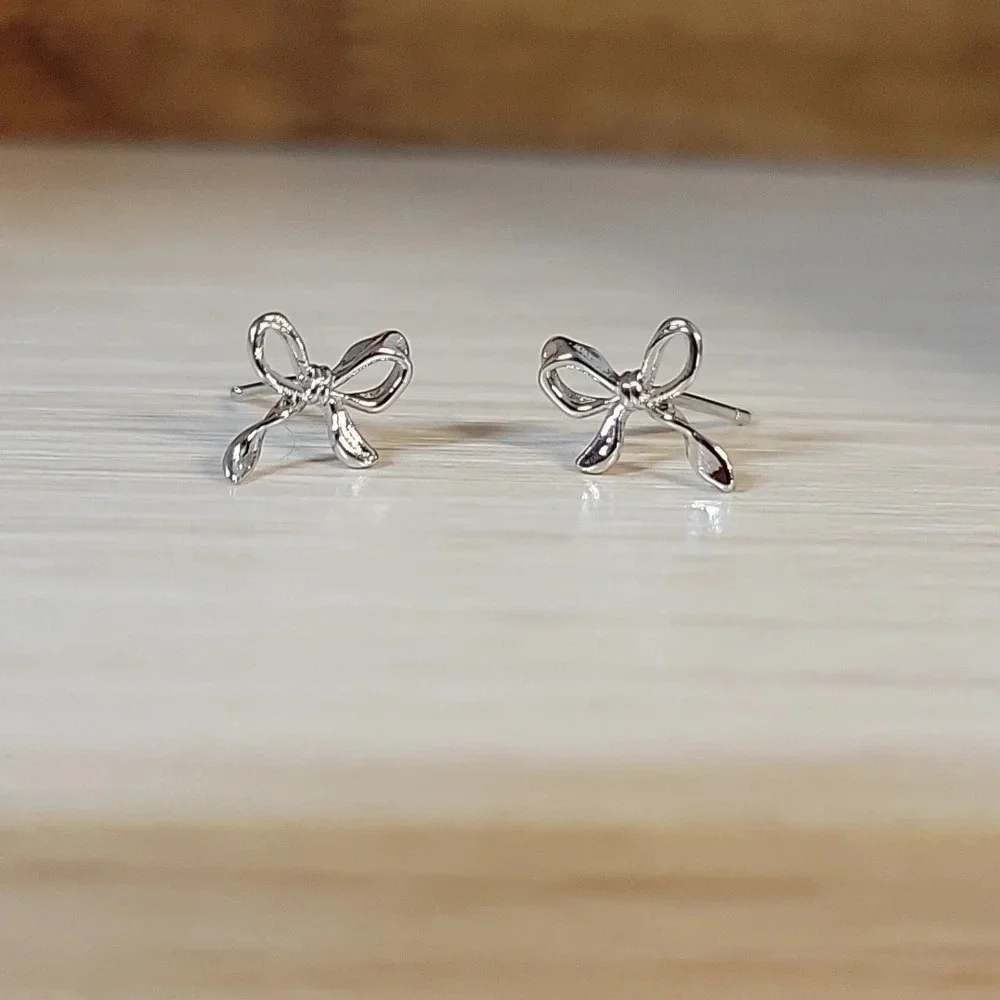 COQUETTE BOW STUD EARRINGS